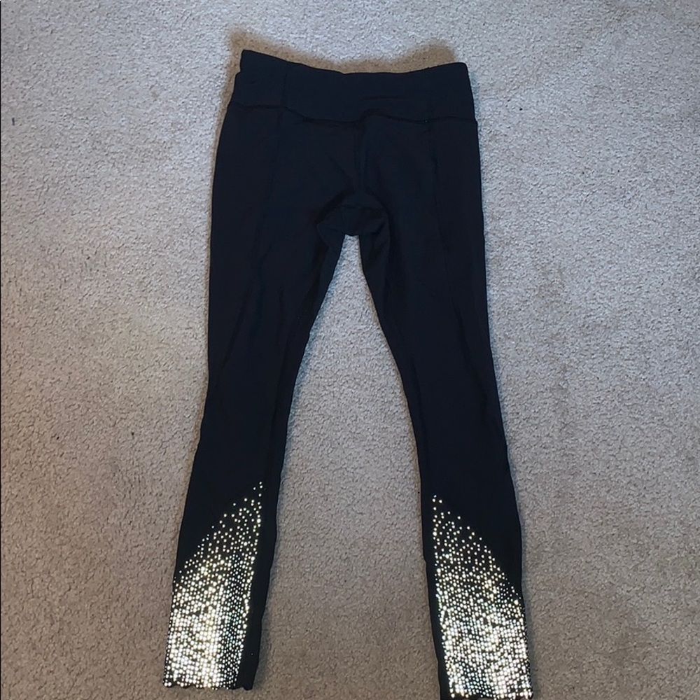 Lululemon black tight stuff tight 7/8 legging sz 4